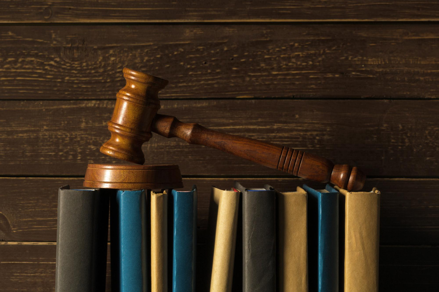 Wooden gavel on legal documents representing legal guidance