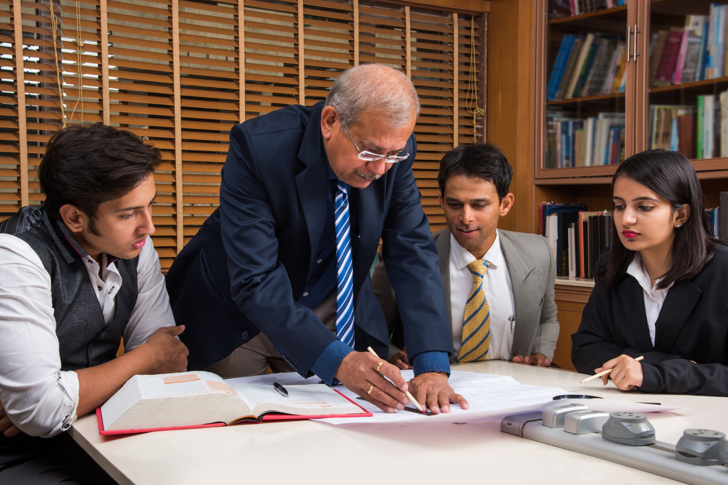 Legal scales, gavel and law books representing justice and legal expertise